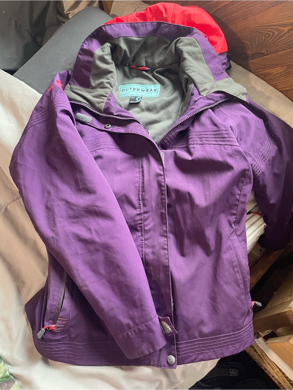 Women’s Purple Ski Jacket with Red Hood Accent